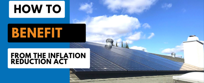 How to benefit form the Inflation Reduction Act shown with large solar panels on top of a roof