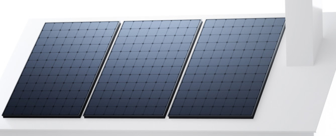 Three large SunPower© solar panels on a sloped roof